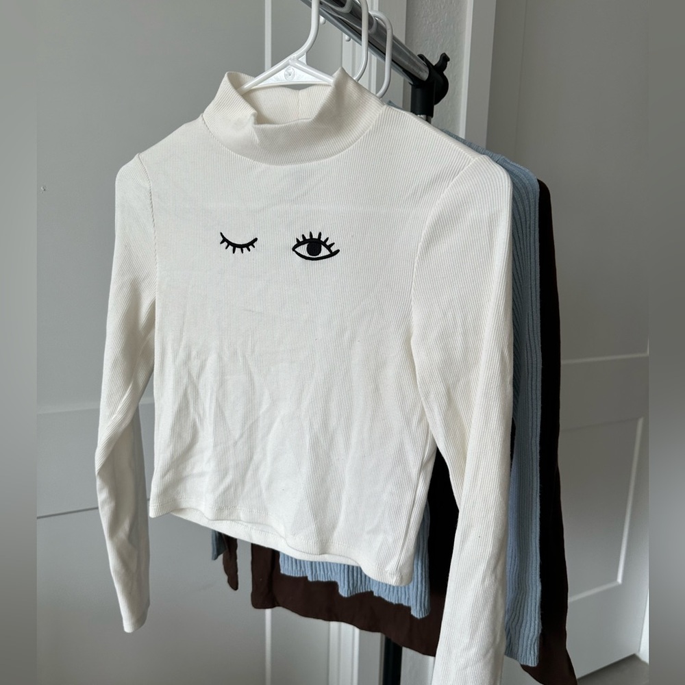 set of three sweaters. white, blue, brown. multi-brand. size s